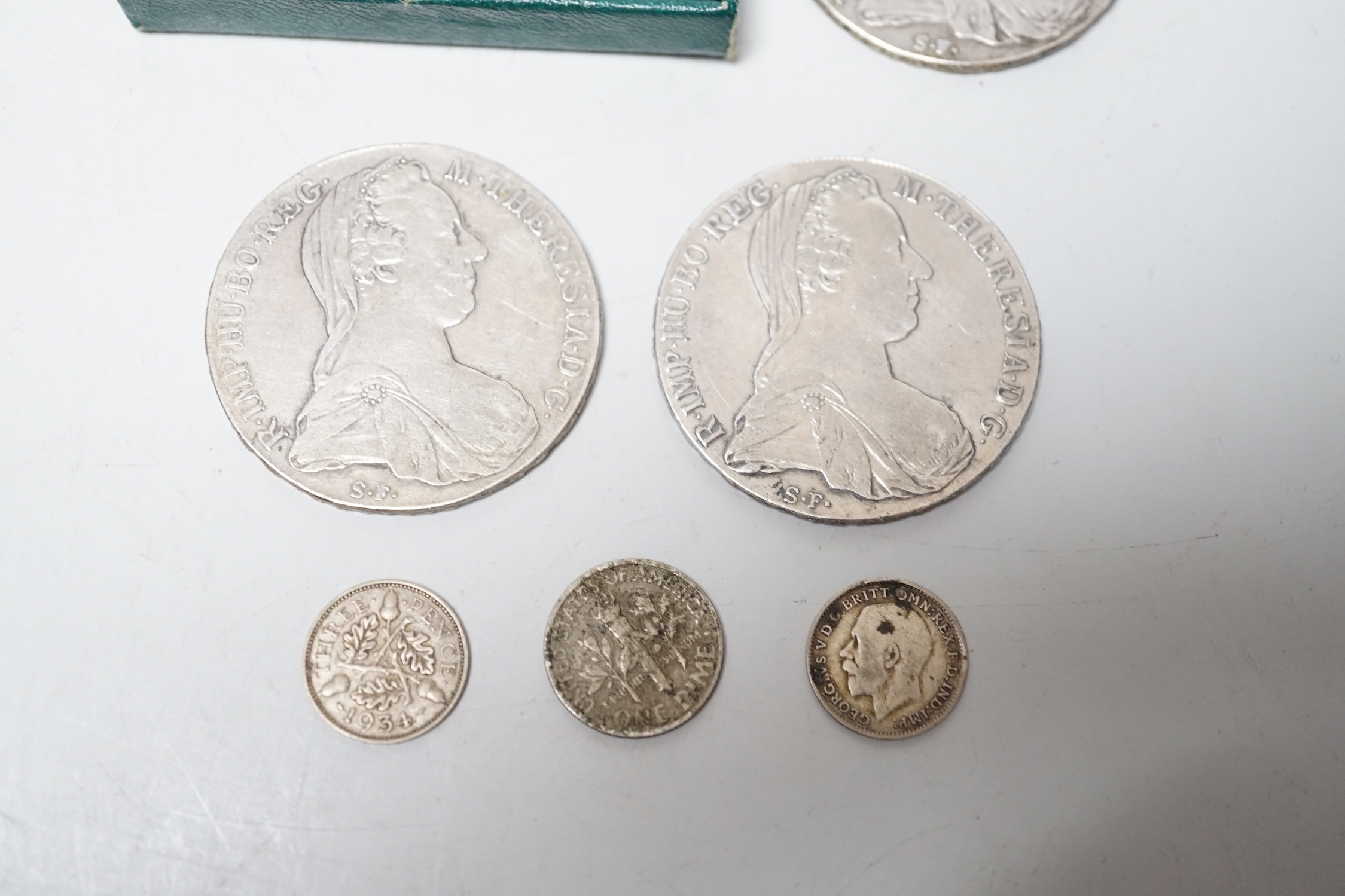 7 assorted coins.